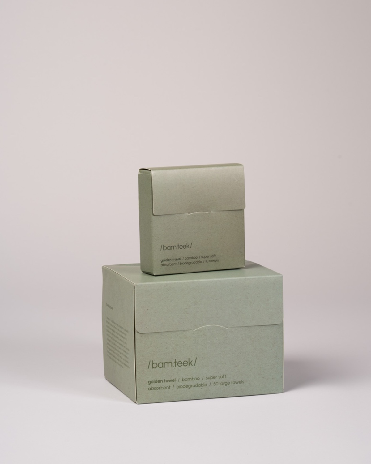 Golden pack boxes from Bamteek Lebanon, showcasing eco-friendly packaging for skincare.